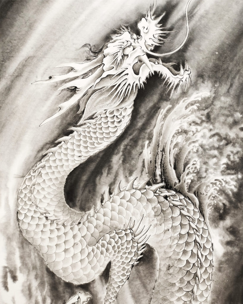 龍と荒れ狂う波を描いた水墨画